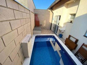 Casa em condomínio piscina privativa churrasqueira